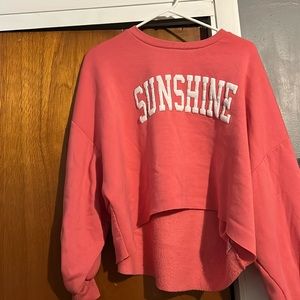 cropped bright pink soft sweatshirt